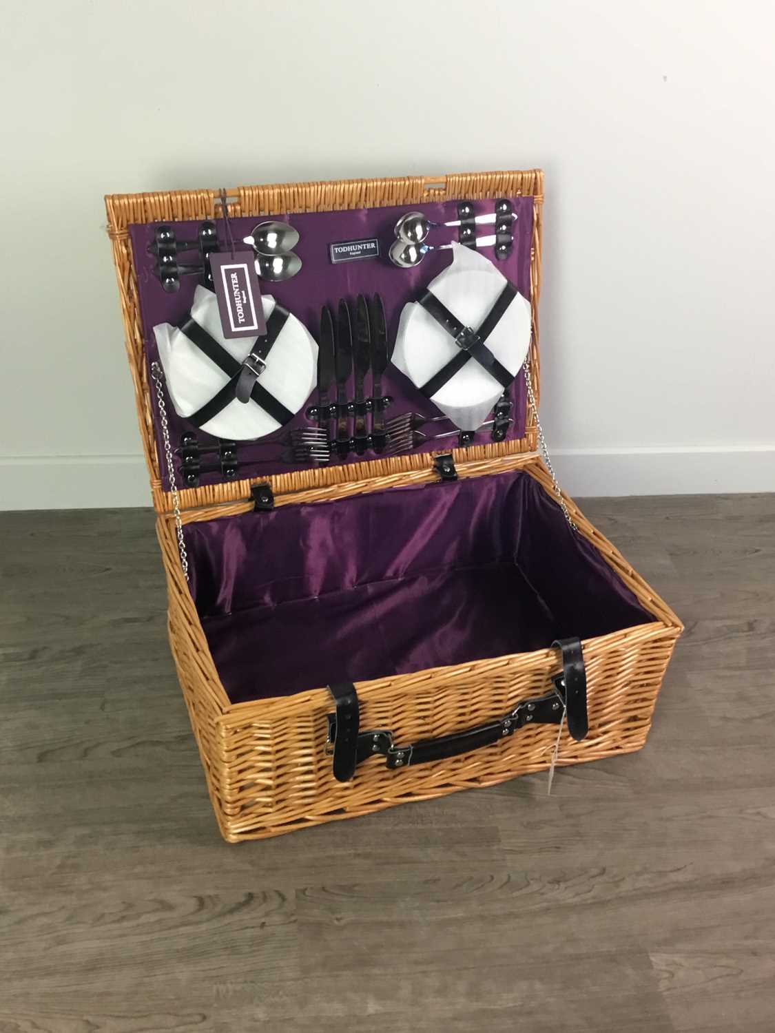 Lot 167 - A TOD HUNTER WICKER PICNIC BASKET