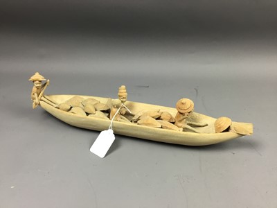 Lot 271 - AN AFRICAN CARVED NATIVE WOOD CANOE WITH FIGURES