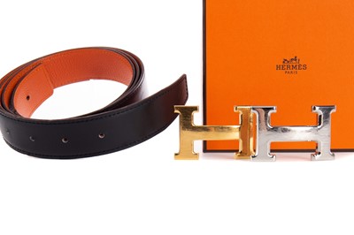Lot 1025 - HERMES LEATHER BELT WITH TWO 'H' BUCKLES