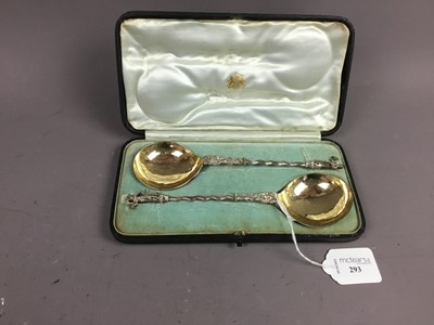 Lot 293 - A PAIR OF DUTCH SILVER AND PARCEL GILT SERVING SPOONS