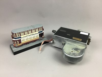 Lot 315 - AN EDINBURGH CORPORATION TRANSPORT TICKET MACHINE, ALONG WITH A MODEL TRAM