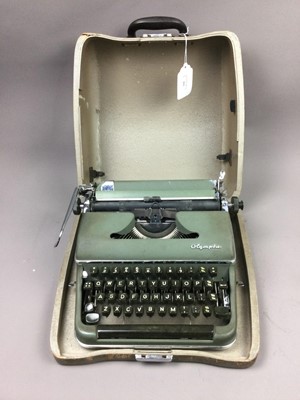 Lot 393 - AN OLYMPIA TYPEWRITER IN CASE