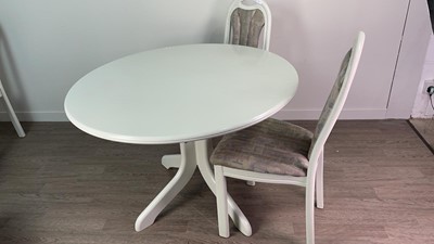 Lot 334 - A MODERN DINING TABLE AND SIX CHAIRS