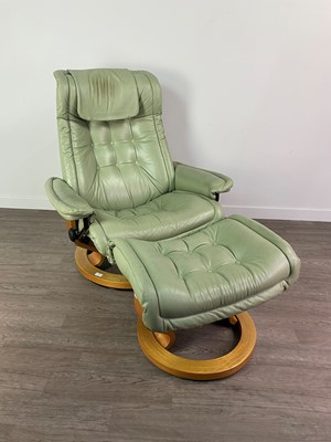 Lot 332 - A MODERN GREEN LEATHER ARM CHAIR WITH STOOL