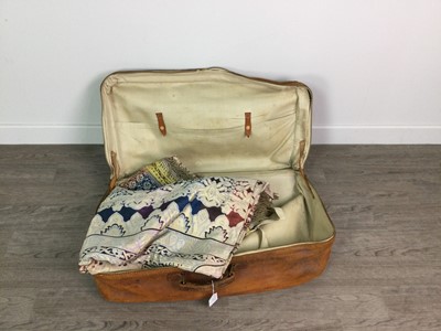 Lot 374 - A LEATHER SUITCASE ALONG WITH AN EMBROIDERED THROW