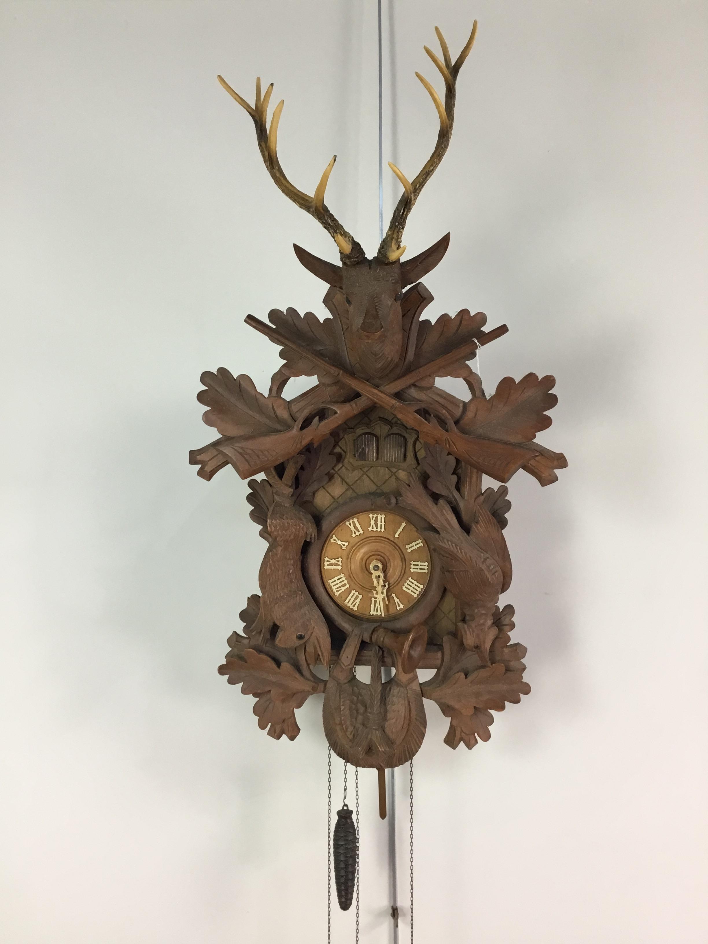 Lot 1201 - A BLACK FOREST CUCKOO WALL CLOCK