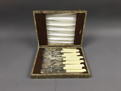 Lot 431 - A LOT OF THREE CASES OF SILVER PLATED CUTLERY ALONG WITH A RESIN FIGURE