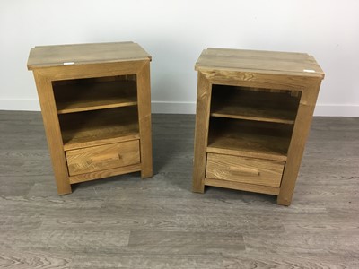 Lot 433 - A PAIR OF MODERN OAK BEDSIDE CABINETS