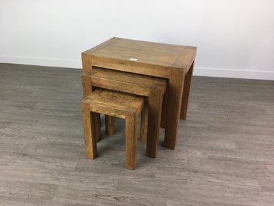 Lot 434 - A MODERN NEXT OF THREE OAK TABLES