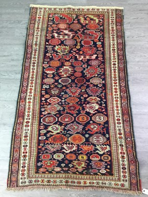 Lot 1667 - A CAUCASIAN BORDERED RUG