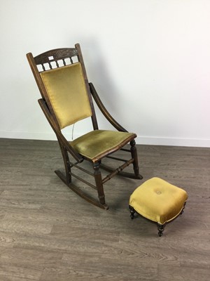 Lot 489 - A VICTORIAN ROCKING CHAIR AND A FOOTSTOOL