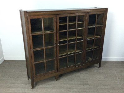 Lot 560 - AN EARLY 20TH CENTURY OAK GLAZED BOOKCASE