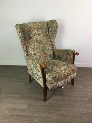 Lot 514 - A WING BACK ARMCHAIR