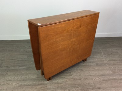 Lot 519 - A TEAK DROP LEAF TABLE