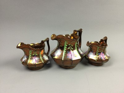 Lot 609 - A GRADUATED SET OF THREE COPPER LUSTRE JUGS AND OTHER CERAMICS