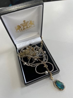 Lot 620 - AN OPAL DOUBLET PENDANT ON CHAIN AND OTHER CHAINS