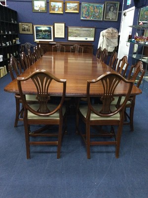 Lot 600 - AN IMPRESSIVE REPRODUCTION MAHOGANY DINING/BOARD TABLE AND SIXTEEN CHAIRS