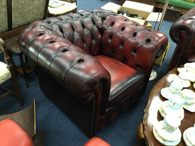 Lot 656 - A PAIR OF OXBLOOD LEATHER CHESTERFIELD BUTTONED ARMCHAIRS