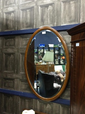 Lot 400A - A 20TH CENTURY STAINED WOOD OVAL WALL MIRROR