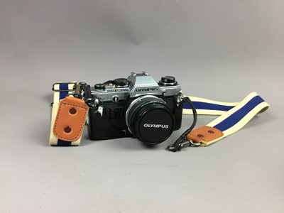 Lot 692 - AN OLYMPUS OM10 CAMERA