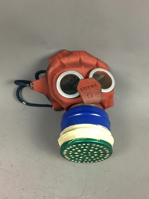 Lot 693 - A WWII CHILD'S 'MICKEY MOUSE' GAS MASK