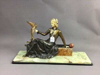 Lot 701 - AN ART DECO STYLE GROUP OF A WOMAN WITH BIRD