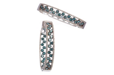 Lot 527 - A PAIR OF BLUE AND WHITE DIAMOND EARRINGS