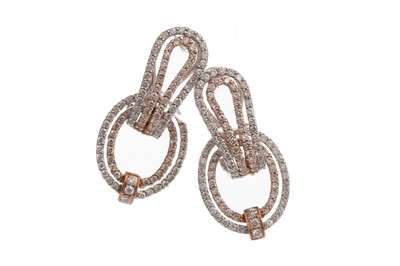 Lot 547 - A PAIR OF ROSE AND WHITE GOLD DIAMOND EARRINGS