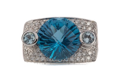 Lot 562 - A BLUE GEM SET AND DIAMOND RING