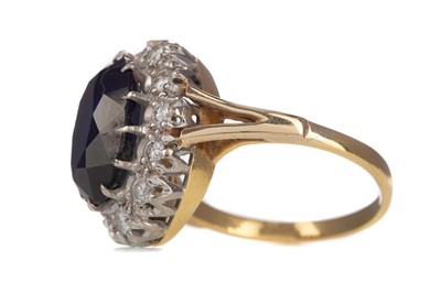 Lot 451 - A SAPPHIRE AND DIAMOND CLUSTER RING