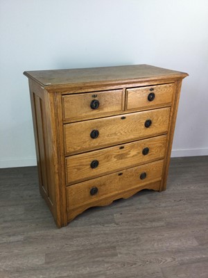 Lot 131 - AN EDWARDIAN ART NOUVEAU OAK WARDROBE AND MATCHING DRESSING CHEST, AND ANOTHER CHEST