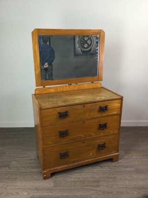 Lot 131 - AN EDWARDIAN ART NOUVEAU OAK WARDROBE AND MATCHING DRESSING CHEST, AND ANOTHER CHEST