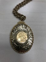 Lot 234 - GOLD SOVEREIGN DATED 1906 in a gold pendant...