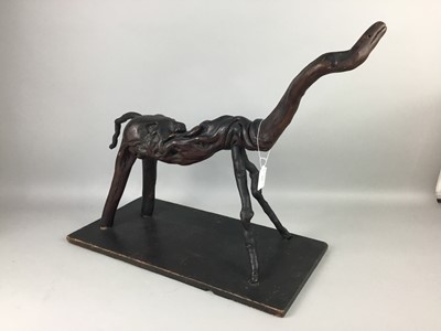 Lot 213 - A 20TH CENTURY POLISHED WOOD ANTHROPOMORPHIC SCULPTURE