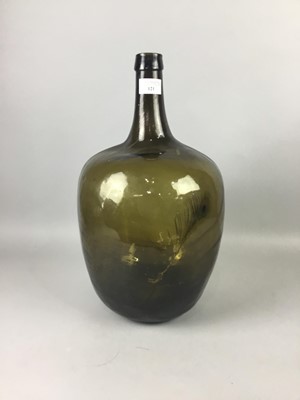 Lot 121 - A MID-19TH CENTURY GREEN GLASS CARBOY