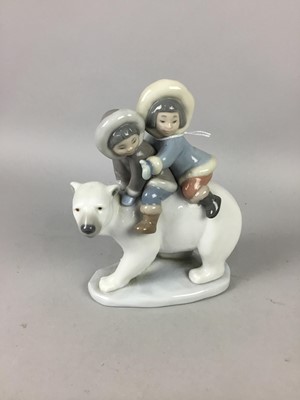 Lot 255 - A LLADRO POLAR BEAR AND CHILDREN GROUP AND OTHERS