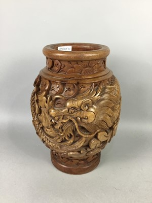 Lot 270 - A CHINESE CARVED HARDWOOD DRAGON BALUSTER VASE