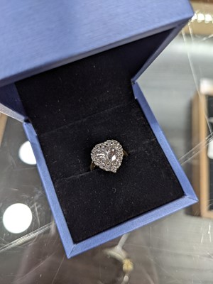 Lot 497 - A HEART SHAPED DIAMOND RING BY ERIC SMITH OF GLASGOW