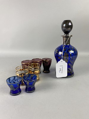 Lot 278 - A SILVER OVERLAID LIQUEUR DECANTER AND FOUR GLASSES