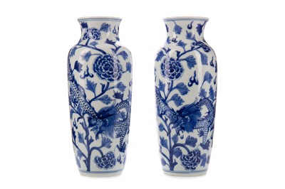 Lot 1723 - A PAIR OF CHINESE BLUE AND WHITE DRAGON AND PEONIES VASES