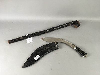 Lot 374 - A KUKRI KNIFE AND A CARVED WOOD CLUB