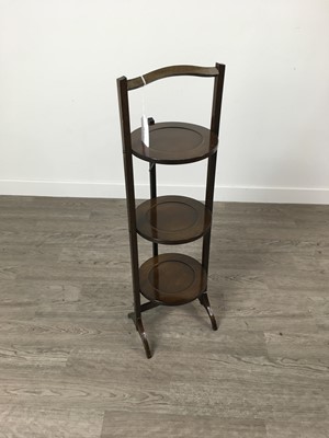 Lot 382 - A MAHOGANY THREE TIER CAKE STAND ALONG WITH A PAIR OF BRASS CANDLESTICKS AND OTHER BRASS WARE