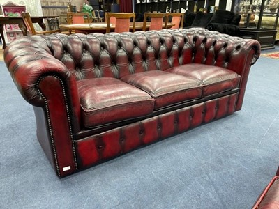 Lot 421 - A CHESTERFIELD OXBLOOD LEATHER SETTEE