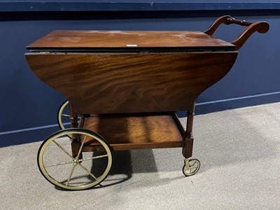 Lot 423 - A MAHOGANY DRINKS TROLLEY