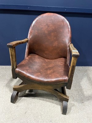 Lot 439 - A FIRESIDE ARMCHAIR