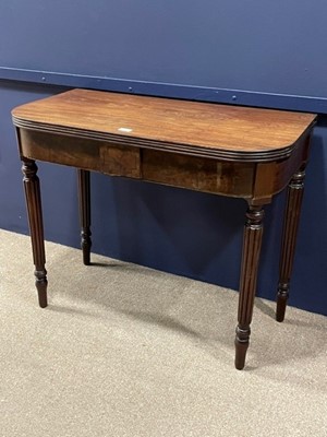 Lot 442 - A GEORGE VI MAHOGANY FOLD OVER TEA TABLE