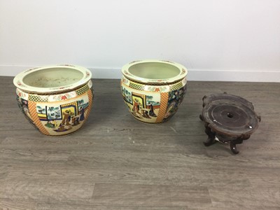 Lot 452 - A PAIR OF CHINESE CIRCULAR PLANTERS AND TWO HARDWOOD STANDS