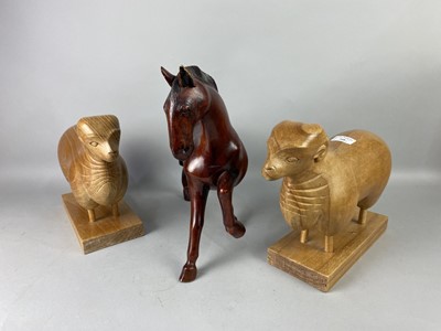 Lot 349 - A PAIR OF CARVED WOOD FIGURES OF RAMS AND A FIGURE OF A HORSE