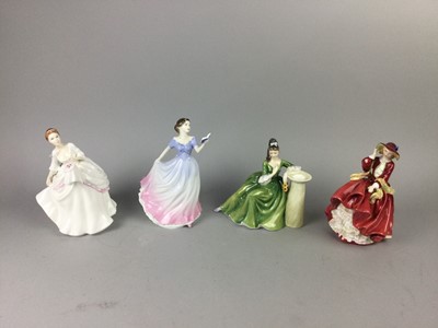 Lot 36 - A ROYAL DOULTON FIGURE OF 'SECRET THOUGHTS' AND THREE OTHERS
