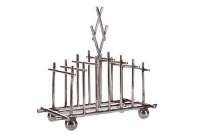 Lot 491 - A SILVER PLATED TOAST RACK IN THE MANNER OF DR CHRISTOPHER DRESSER
